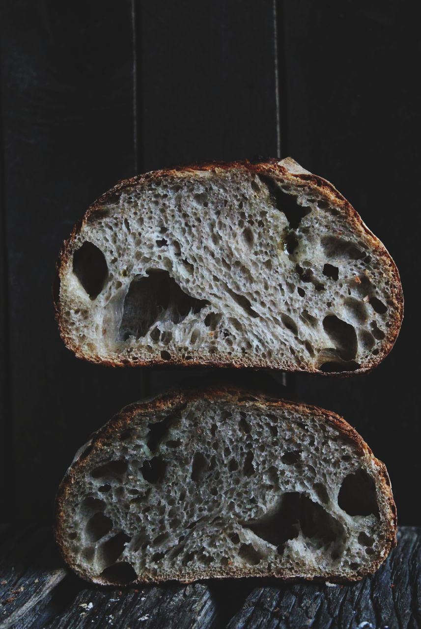 close-up, bread, still life, indoors, no people, food, food and drink, freshness, metal, textured, brown, focus on foreground, wellbeing, slice, pattern, rough, indulgence, studio shot, healthy eating, ready-to-eat, black background, temptation