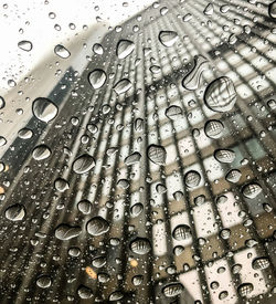 Full frame shot of wet glass window