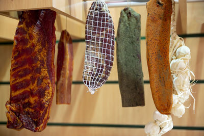 Close-up of ice cream hanging at store