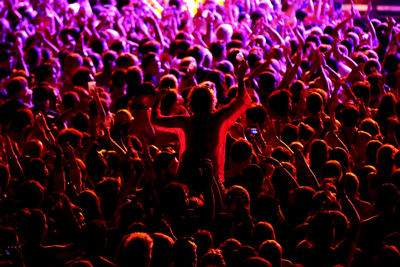 High angle view of people enjoying at music concert