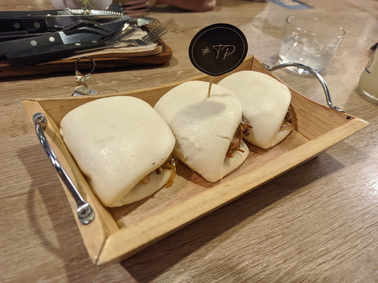 HIGH ANGLE VIEW OF ICE CREAM ON WOODEN TABLE