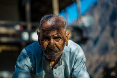 Portrait of man wearing mask outdoors