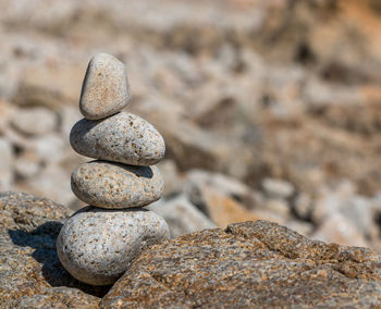 Close-up of stone stack on rock