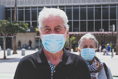 Portrait of man wearing mask outdoors