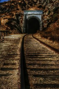 Railroad tracks in tunnel