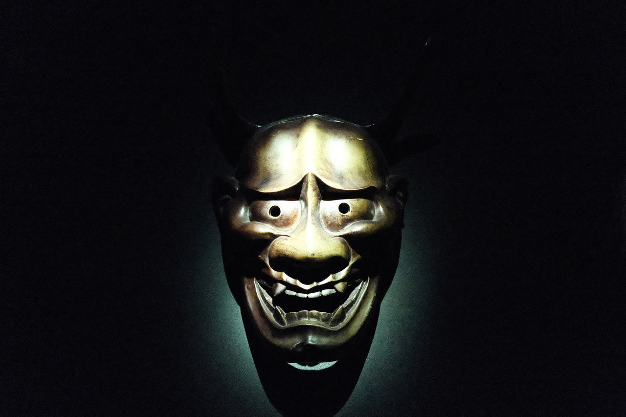 darkness, mask, disguise, mask - disguise, black, human head, black background, indoors, costume, masque, celebration, copy space, studio shot, mystery, clothing, close-up, single object, representation, spooky, halloween, horror, human skeleton, fear, bone, dark