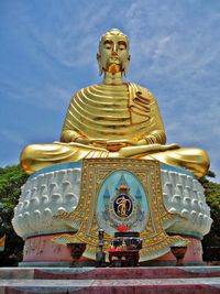 Low angle view of large buddha statue