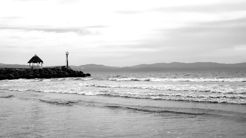 Scenic view of beach against sky