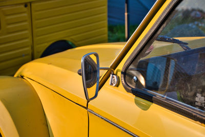 Close-up of yellow car