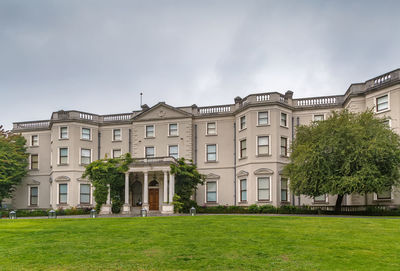 View of residential buildings against sky