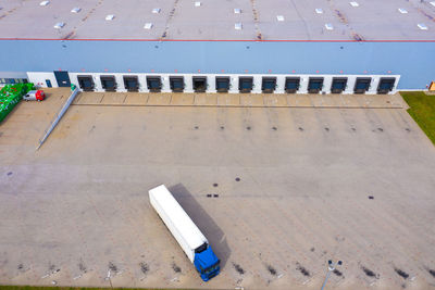 Aerial view of goods warehouse. logistics center in industrial city zone from above. aerial view