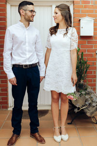 Young couple standing outdoors