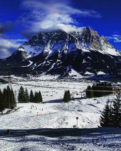 Scenic view of snow covered mountains