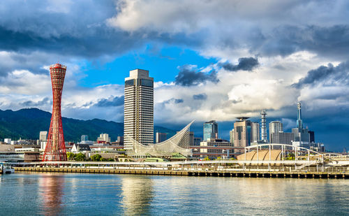 Modern buildings in city against sky