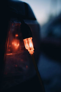 Close-up of illuminated light bulb