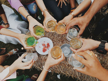 High angle view of people drinking glasses