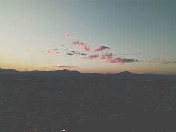 Scenic view of landscape at sunset