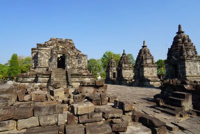 Old temple building against clear sky