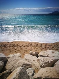 Scenic view of beach against sky