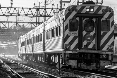 Train at railroad station against sky