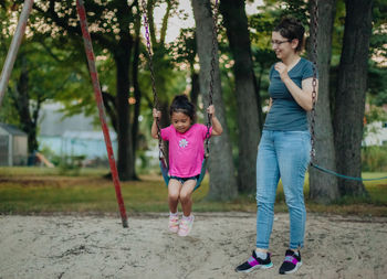 Woman with daughter in park