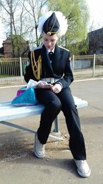 Portrait of a man sitting outdoors