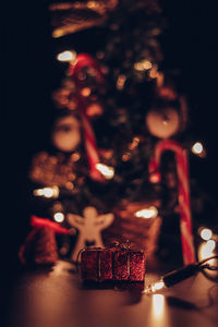 Illuminated christmas tree on table