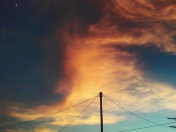 Low angle view of cloudy sky at sunset