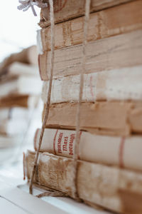 Close-up of paper stack on wood
