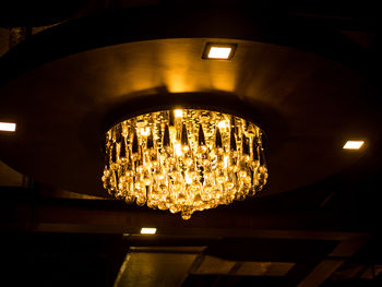 Low angle view of illuminated chandelier