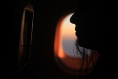 Silhouette of trees against sky at sunset
