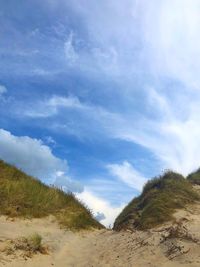 Low angle view of land against sky