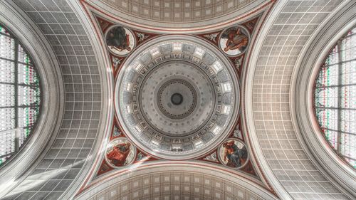 Directly below shot of ceiling of building