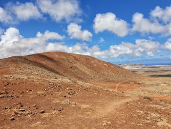 Scenic view of desert against sky