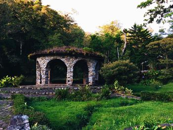 Gazebo in park against sky