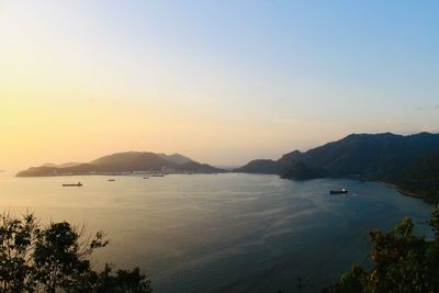 Scenic view of sea against sky at sunset