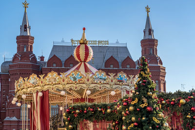 Moscow, russia. historical museum on red square and christmas decorations.