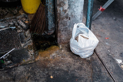 High angle view of garbage on wet street