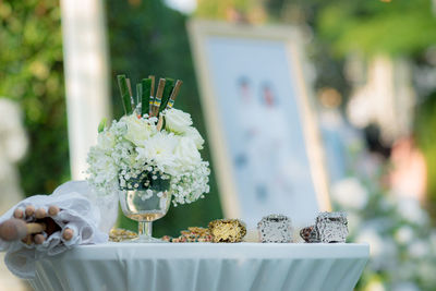 Close-up of white flowers on table