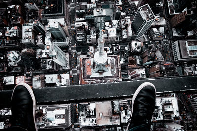 Shoes over cityscape