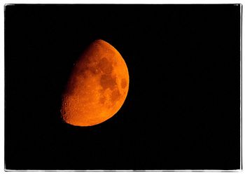 Close-up of moon against clear sky at night