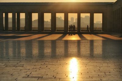 Sun shining through built structure