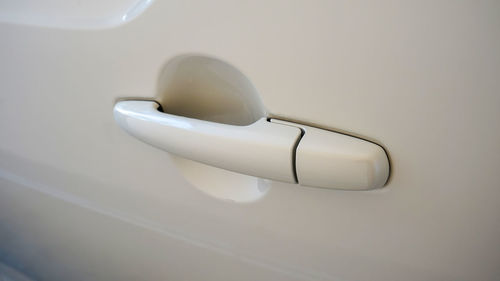 High angle view of white car on door