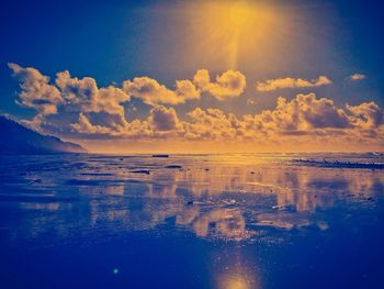 Scenic view of sea at sunset