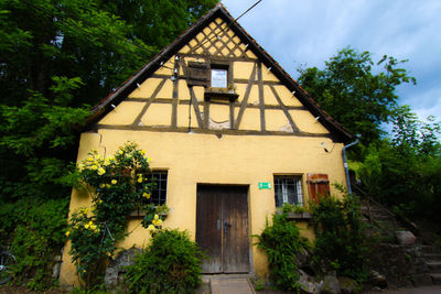 Low angle view of house against sky