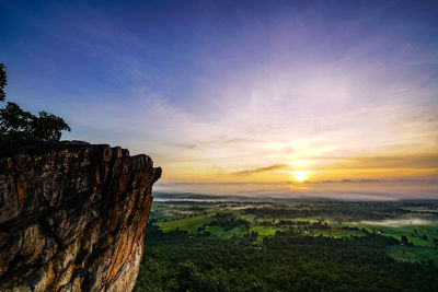 Scenic view of landscape against sky during sunset