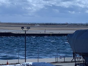 Scenic view of sea against sky during winter