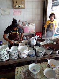 Young woman working at table