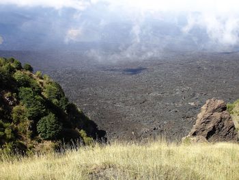Scenic view of land against sky