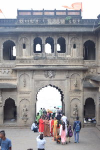 Group of people in front of historical building